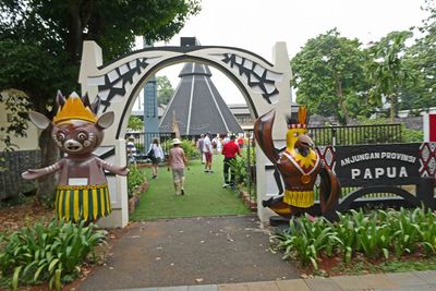 Entering the Papua, Indonesia outdoor exhibit in Museum Indonesia
