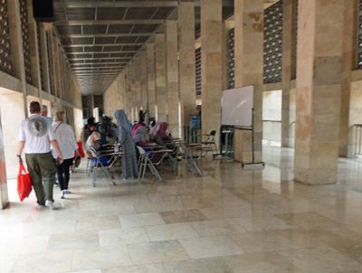 Classes are held in Istiqlal Mosque to teach women to read the Koran
