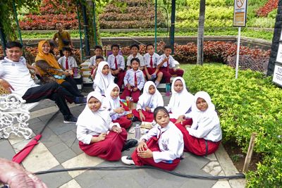 School kids waiting to go into the 10 November Museum in Surabaya, Indonesia
