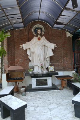 Statue of Jesus in courtyard of the Church of the Birth of Our Lady in Surabays