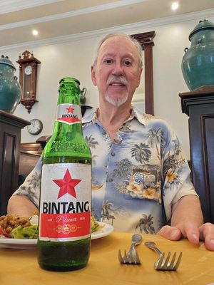 Having a local Indonesian beer with lunch