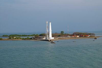 Pulau Karangjamuang Lighthouse is located on a small island at the entrance to the Madura Strait