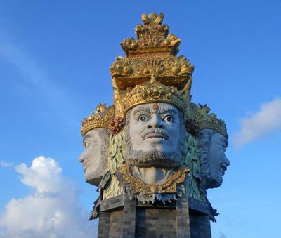 Catur Muka statue at the entrance to the Port of Benoa faces point to each of the compass points