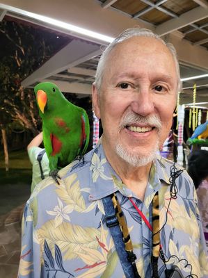 Interacting with an Eclectus Parrot at Bali's Bird Park