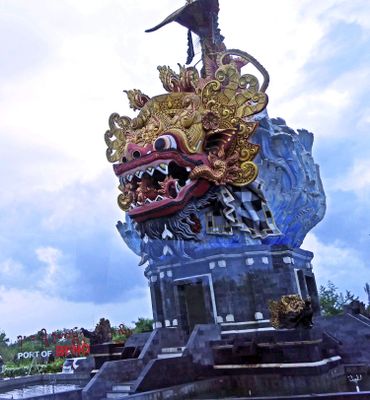 Barong (character in Balinese mythology) head on fish body statue at the Port of Benoa, Bali, Indonesia
