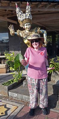 Susan with statue at the exit of Tanah Lot