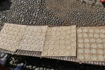 Indonesian rice cakes drying in the sun