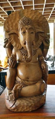 Large Ganesha statue carved from a single piece of wood