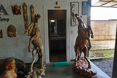 6 ft tall horses outside the restroom at Yana Art Gallery