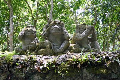 Hear, see, and speak no evel statues in the Monkey Forest Sanctuary, Ubud