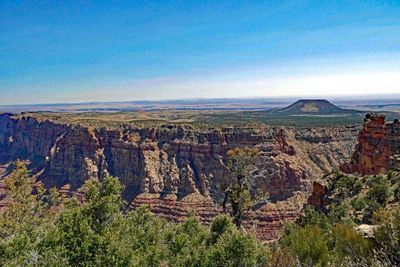 The Grand Canyon joins the Painted Desert with a view of Cedar Mountain