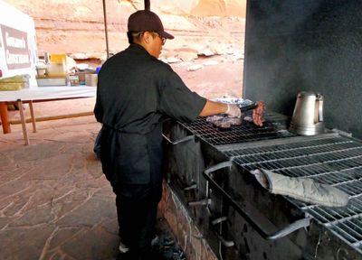 Grilling steaks for Navajo Backcountry Cookout