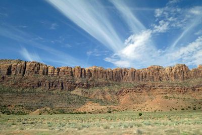 Interesting clouds over sandstone cliffs near Moab, Utah