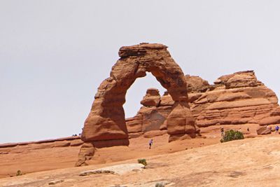 Delicate Arch with a person to show the scale
