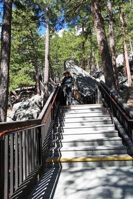 Susan on the last of 422 steps on the Presidential Trail at Mount Rushmore