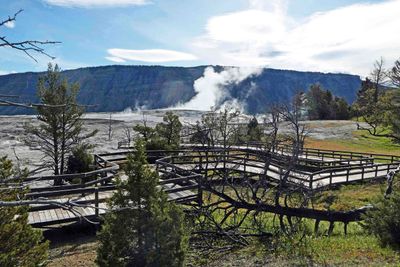 Wooden walkway through Mammoth Hot Springs in Yellowstone