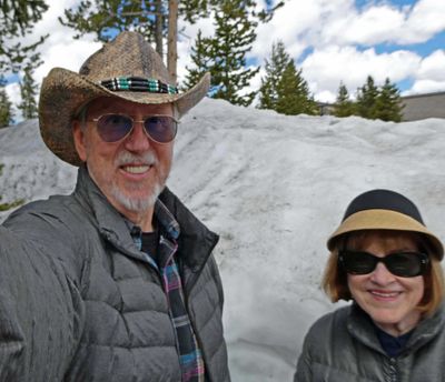 Snowdrift taller than Susan at Canyon Village in Yellowstone