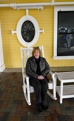 Susan on porch of Yellowstone Lake Hotel (built in 1891)