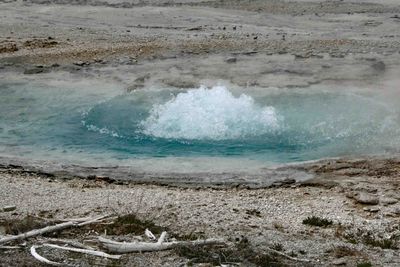 Bubbling pool getting bigger along the Fountain Paint Pot Trail
