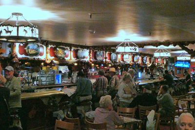 The Million Dollar Cowboy Bar has Saddles for barstools