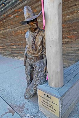'Slim' is a bronze statue on the street in Jackson, WY
