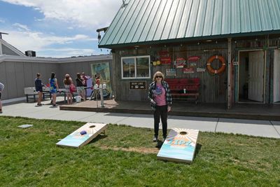 Game of cornhole after lunch at Zipz in Garden City, Utah