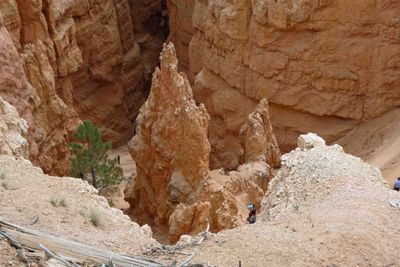 Looking down into Bryce Canyon at hikers from the trail rim near Sunset Point