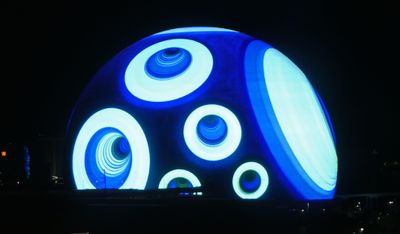 Watching the changing patterns on The Sphere from our hotel room