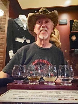 Bill drinking the Mob Museum Moonshine Flight