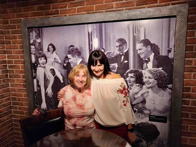Susan & Meredith blending in with the Prohibition-era Speakeasy patrons