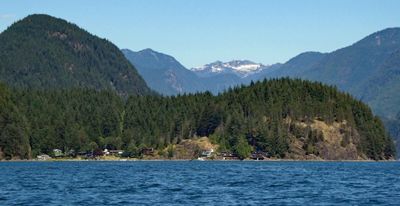 Snow on mountains viewed from Indian Arm Fjord near Vancouver