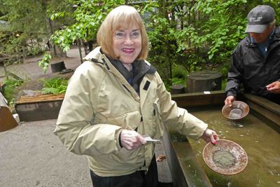 Susan panning for gold at Liarsville camp