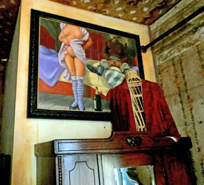 Original painting and wallpaper in the Red Onion Saloon Brothel