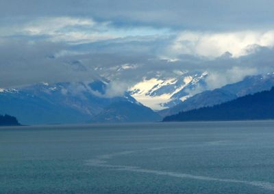 Sun breaking through as we leave Glacier Bay