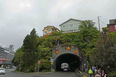 Ketchikan's 274 foot tunnel was completed in 1954 to add traffic capacity without removing the houses on the hill above