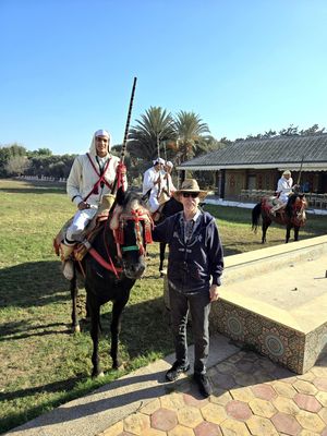 Bill with one of the horsemen at Fantasia Restaurant in Agadir.jpg