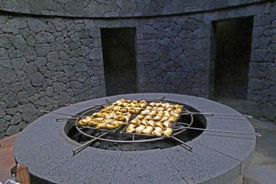 Chicken cooking over heat from volcano vents at Timanfaya Visitors Centre.JPG