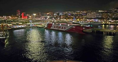 Nighttime view of Santa Cruz de Tenerife from back of ship.jpg