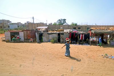Driving through the village of Rafit, Senegal.JPG