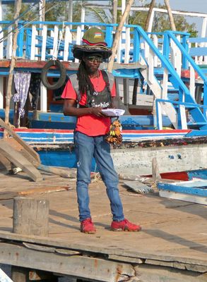 Vendor with many hats.JPG