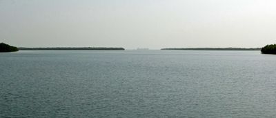 Ship silhoutte is where the Gambia River flows into the Atlantic Ocean.JPG
