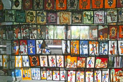 Batik cloth for sale in market of Grand Bassam, Ivory Coast.JPG