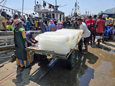 Ice being delivered on the docks at Sekondi Fish Market.jpg