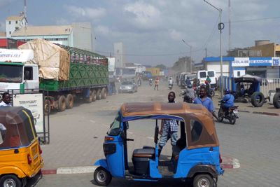 Tuk tuks on the street in Loma, Togo.JPG