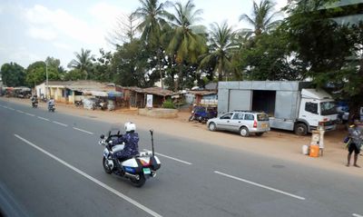 Our police escort for shore tour in Togo.JPG