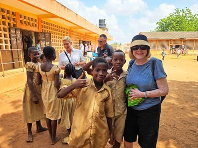 Akato (Togo) Primary School students with cruisers from Regent Seven Seas.jpg