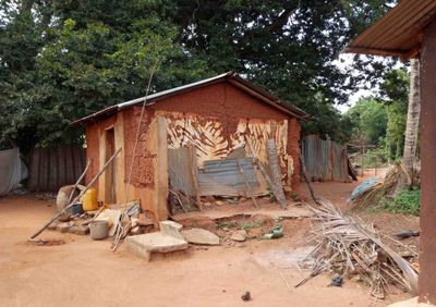 Many villagers in Akepe still live in traditional Togolese housing.JPG