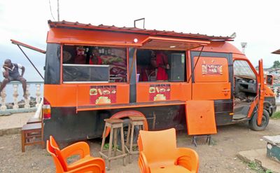 Food truck with hot dogs and hamburgers beside the beach in Pantufo, Sao Tome.JPG