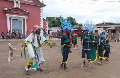 Villagers performing in front of church in Pantufo fishing village, Sao Tome.JPG