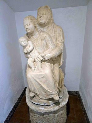 Interesting (probably 17th century) statue of the Holy Family in Sao Tome Museum.jpg